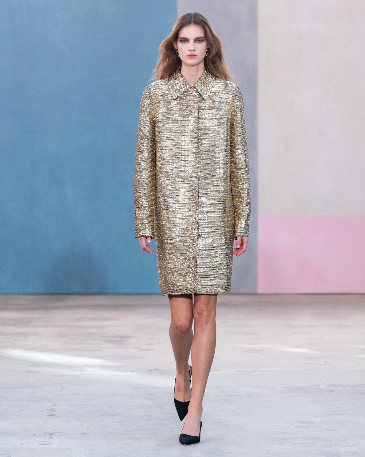 Carolina Herrera Fall 2026 Collection, Look 42 Model in a gold embroidered coat from the Carolina Herrera Fall 2026 collection